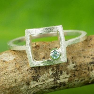 Alternate image for Thailand Handcrafted Sterling Silver Ring with Blue Topaz Looking Outside