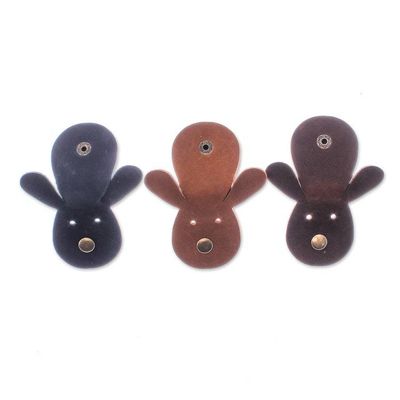 Alternate image for Set of Three Handcrafted Bunny-Shaped Leather Cable Ties Energizing Bunnies