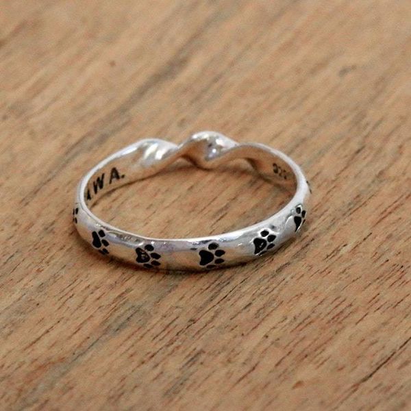 Alternate image for Sterling Silver Band Ring with Paw Print Motifs from Bali Animal Twist