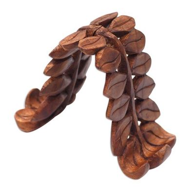 Alternate image for Hand-Carved Polished Leafy Jempinis Wood Phone Holder The Leaves