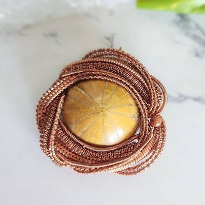 Alternate image for Urchin Fossil Copper Wire Wrapped Pendant