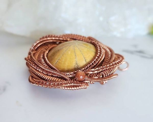 Alternate image for Urchin Fossil Copper Wire Wrapped Pendant