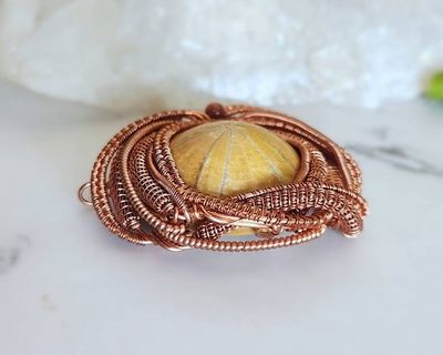 Alternate image for Urchin Fossil Copper Wire Wrapped Pendant
