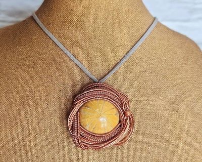 Alternate image for Urchin Fossil Copper Wire Wrapped Pendant