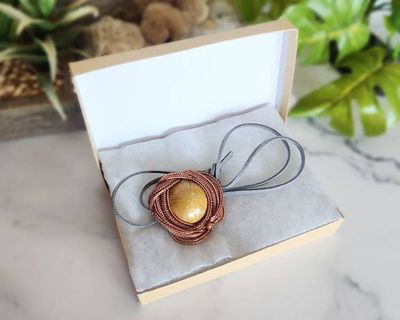 Alternate image for Urchin Fossil Copper Wire Wrapped Pendant