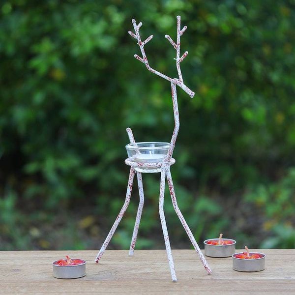 Alternate image for Handcrafted Iron Reindeer Tealight Holder in White and Red Winter Reindeer in Red