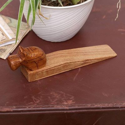 Alternate image for Hand-Carved Hippo Wood Door Stop in Natural Brown Protective Hippo