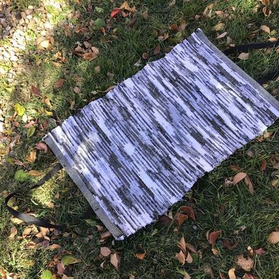 Alternate image for Black and white woven firewood carrier