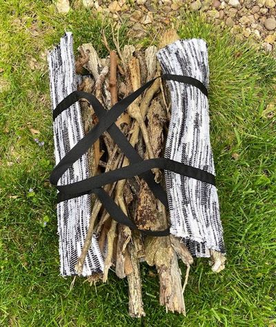 Alternate image for Black and white woven firewood carrier