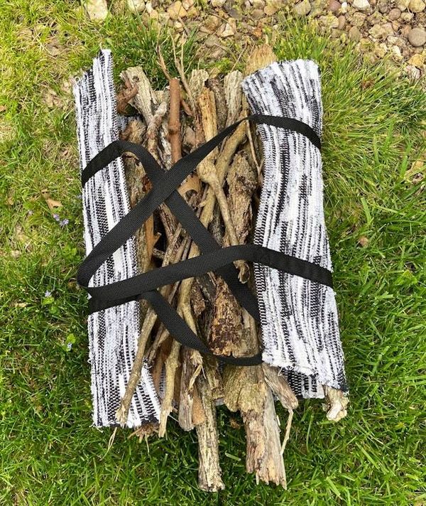 Alternate image for Black and white woven firewood carrier