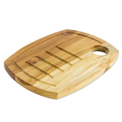 Alternate image for Handcrafted Teak Wood Carving Board with Grooves Presentation