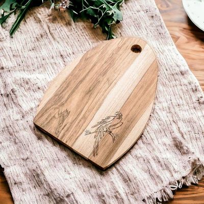Alternate image for Semi-Oval Laurel Wood Cutting Board with Macaw Engraving Macaws Treats