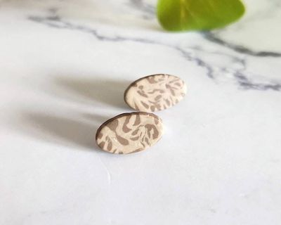 Alternate image for Animal Print Glow in the Dark Stud Earrings
