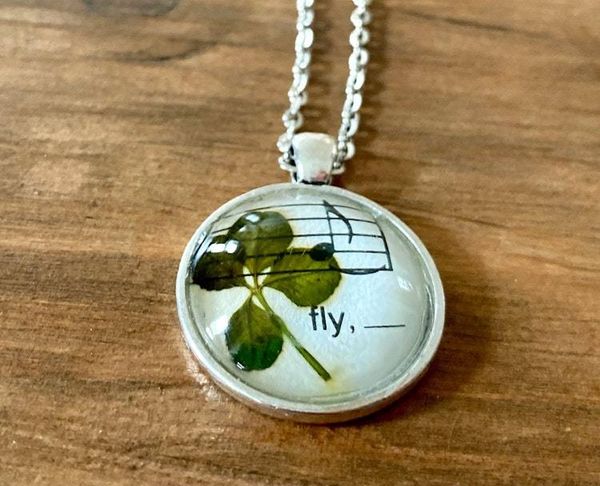 Alternate image for Genuine four-leaf clover necklace with Beatles sheet music (fly from Blackbird)
