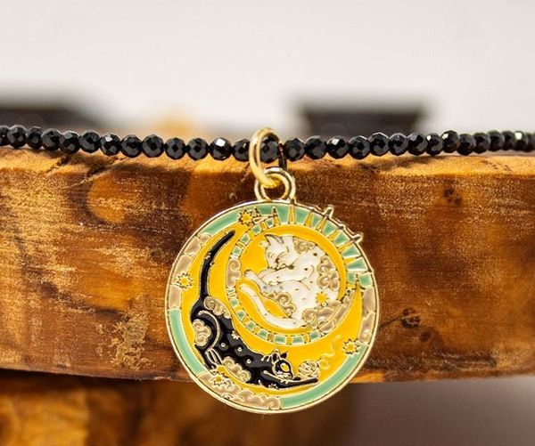 Alternate image for Celestial Enamel Moon and Sun Cat Black Spinel Necklace