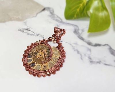 Alternate image for Ammonite and Goldstone Copper Wire Wrapped Pendant