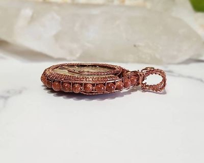 Alternate image for Ammonite and Goldstone Copper Wire Wrapped Pendant