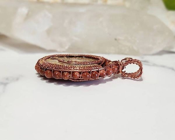 Alternate image for Ammonite and Goldstone Copper Wire Wrapped Pendant