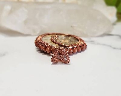 Alternate image for Ammonite and Goldstone Copper Wire Wrapped Pendant