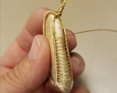 Alternate image for Reversible Wire Wrapped Shell Pendant