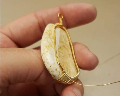 Alternate image for Reversible Wire Wrapped Shell Pendant