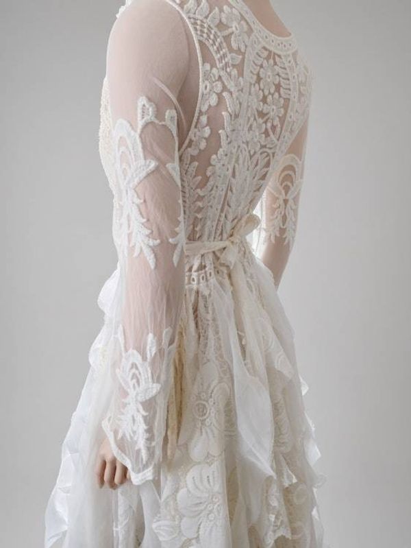 Alternate image for Handcrafted ivory lace long sleeve Tea-Length dress with intricate decor and fringe