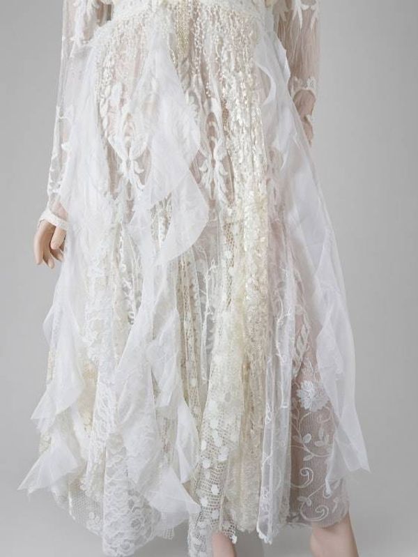 Alternate image for Handcrafted ivory lace long sleeve Tea-Length dress with intricate decor and fringe