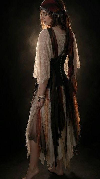 Alternate image for Ragged pirate ensemble with layered skirt, embellished corset, headwear and studded belt