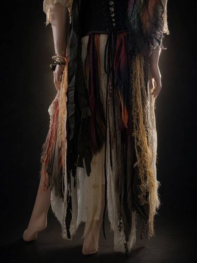 Alternate image for Ragged pirate ensemble with layered skirt, embellished corset, headwear and studded belt