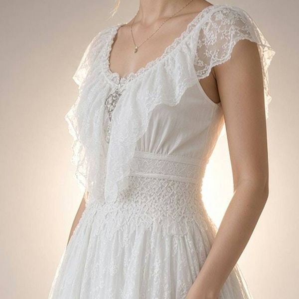 Alternate image for Romantic ivory lace Bohemian maxi dress with flutter sleeves and lace up back
