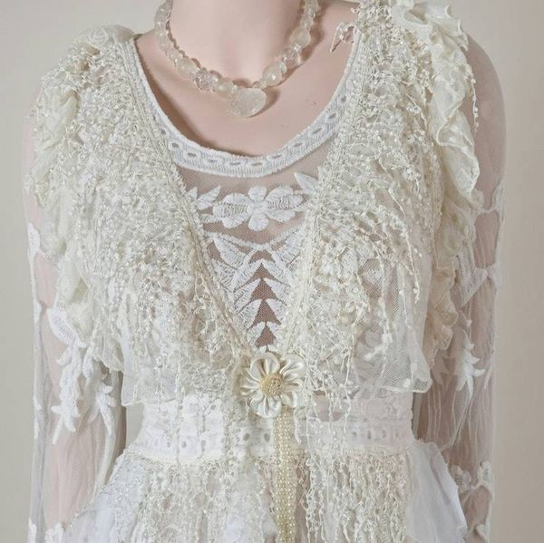 Alternate image for Handcrafted ivory lace long sleeve Tea-Length dress with intricate decor and fringe