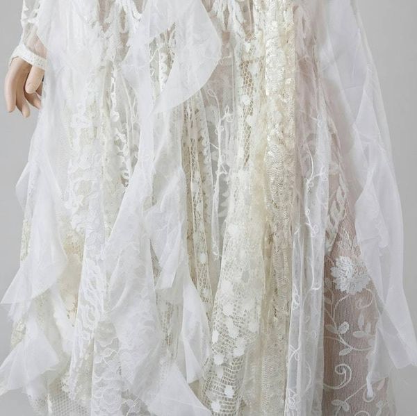 Alternate image for Handcrafted ivory lace long sleeve Tea-Length dress with intricate decor and fringe