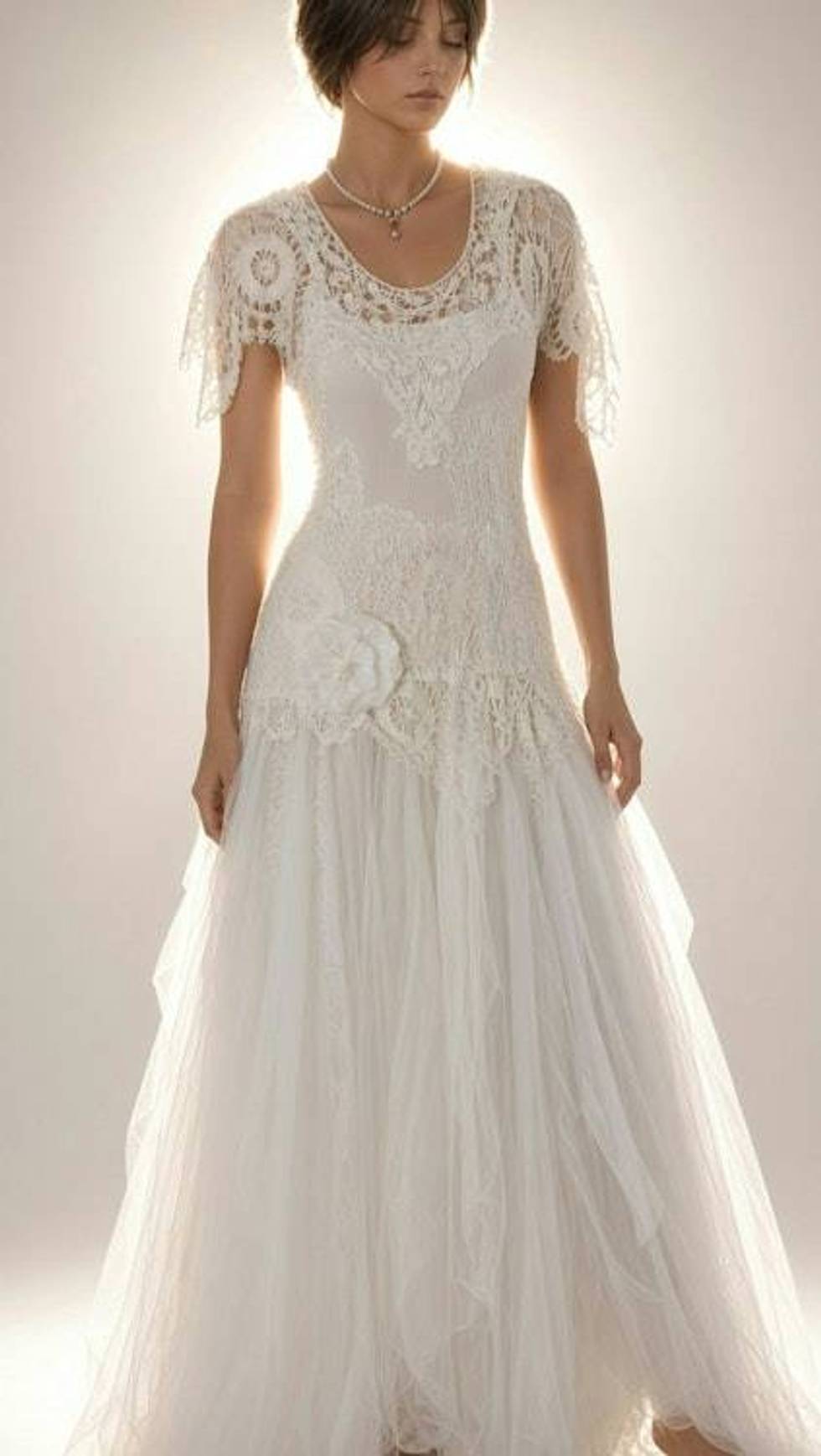 Ethereal white lace, tulle and crochet Bohemian wedding gown