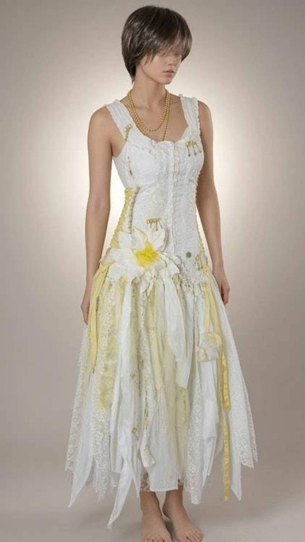 Ethereal handcrafted fairy Bohemian wedding dress with lace, fringe and ribbons