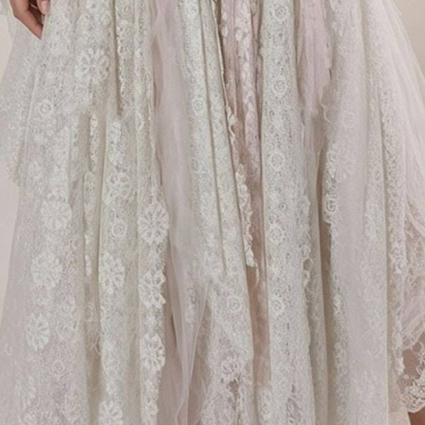 Alternate image for Ethereal handkerchief hem lace dress with fringed sleeves and romantic back detail