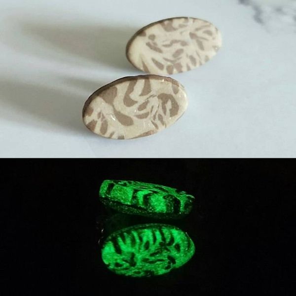 Alternate image for Animal Print Glow in the Dark Stud Earrings