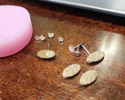 Alternate image for Animal Print Glow in the Dark Stud Earrings