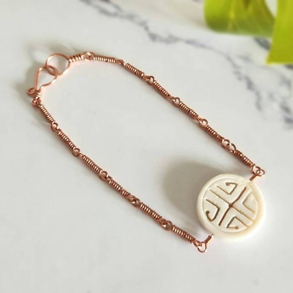 Carved Bone Medicine Wheel Copper Bracelet