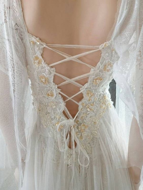 Alternate image for Ethereal White Lace Wedding Dress with Sheer Cape Sleeves and lace up Back