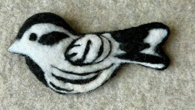 Alternate image for Needle felted bird pin, carefully crafted from wool to create a small, lightweight brooch in black and white