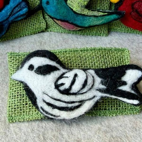 Alternate image for Needle felted bird pin, carefully crafted from wool to create a small, lightweight brooch in black and white