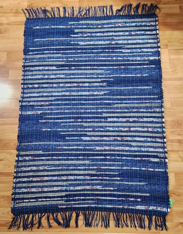 Alternate image for Navy Blue Rag Rug with Tan and Floral highlights.  49 x 36 inches