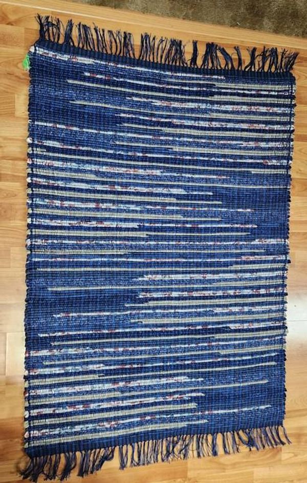 Alternate image for Navy Blue Rag Rug with Tan and Floral highlights.  49 x 36 inches