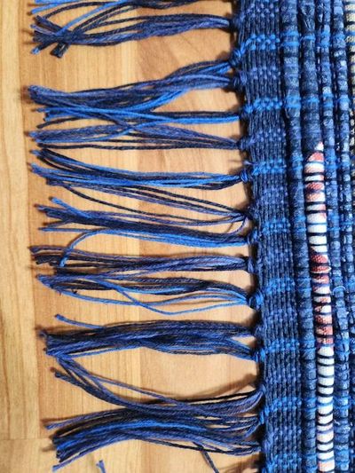 Alternate image for Navy Blue Rag Rug with Tan and Floral highlights.  49 x 36 inches