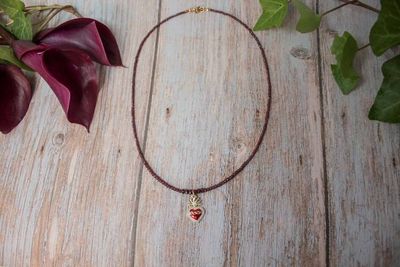 Alternate image for Sacred Flame Graduated Red Garnet Sacred Heart Necklace